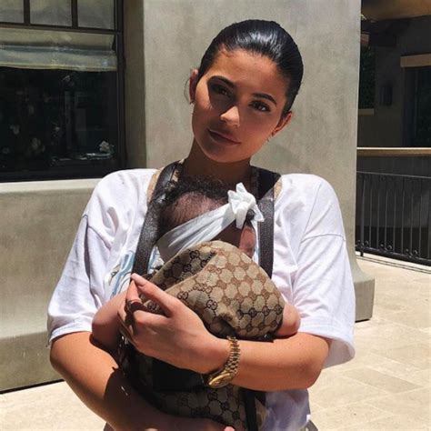 gucci baby carrier kylie jenner|Kylie Jenner Holds Baby Stormi in an $820 Gucci Baby .